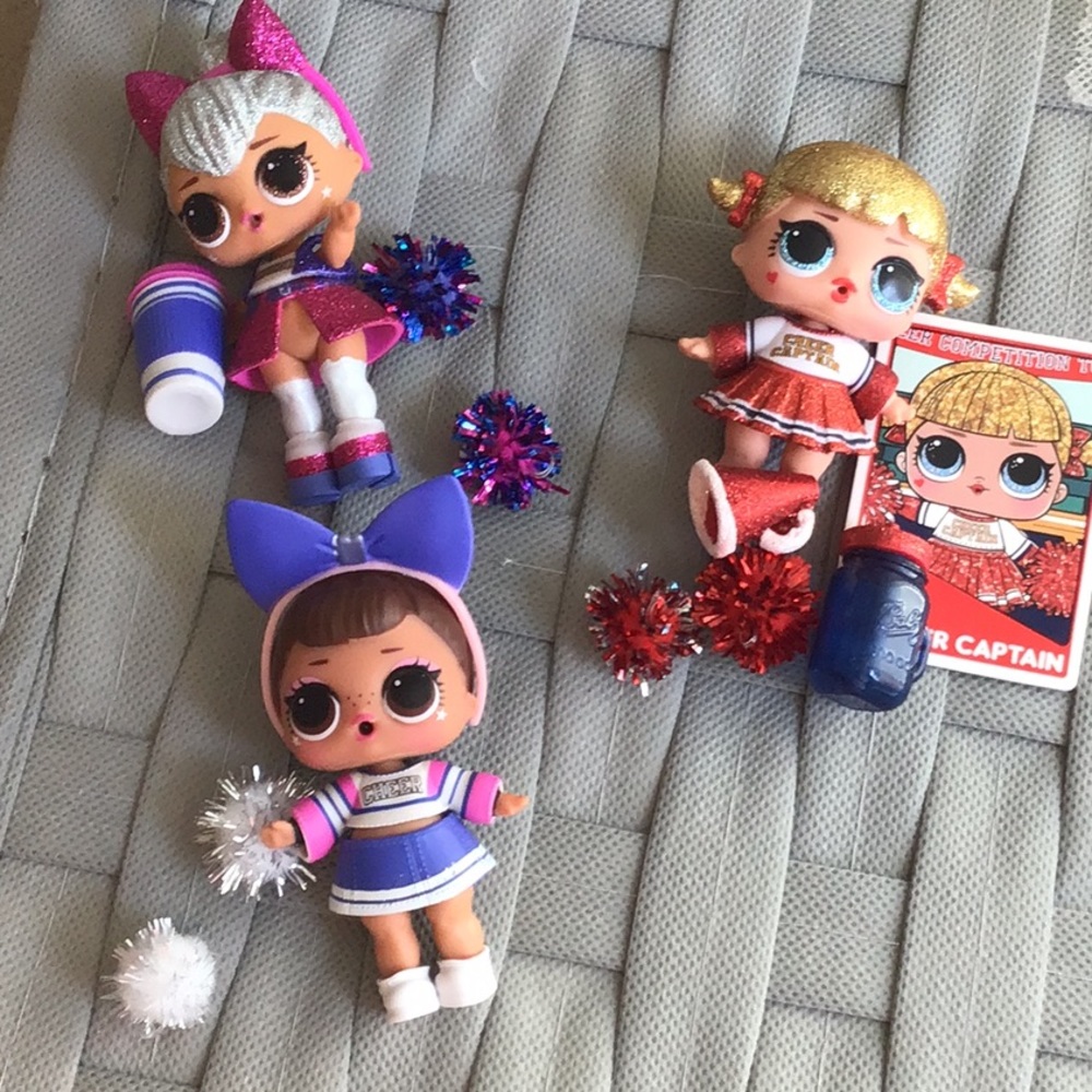 3 cheerleader L.O.L dolls with all accessories.